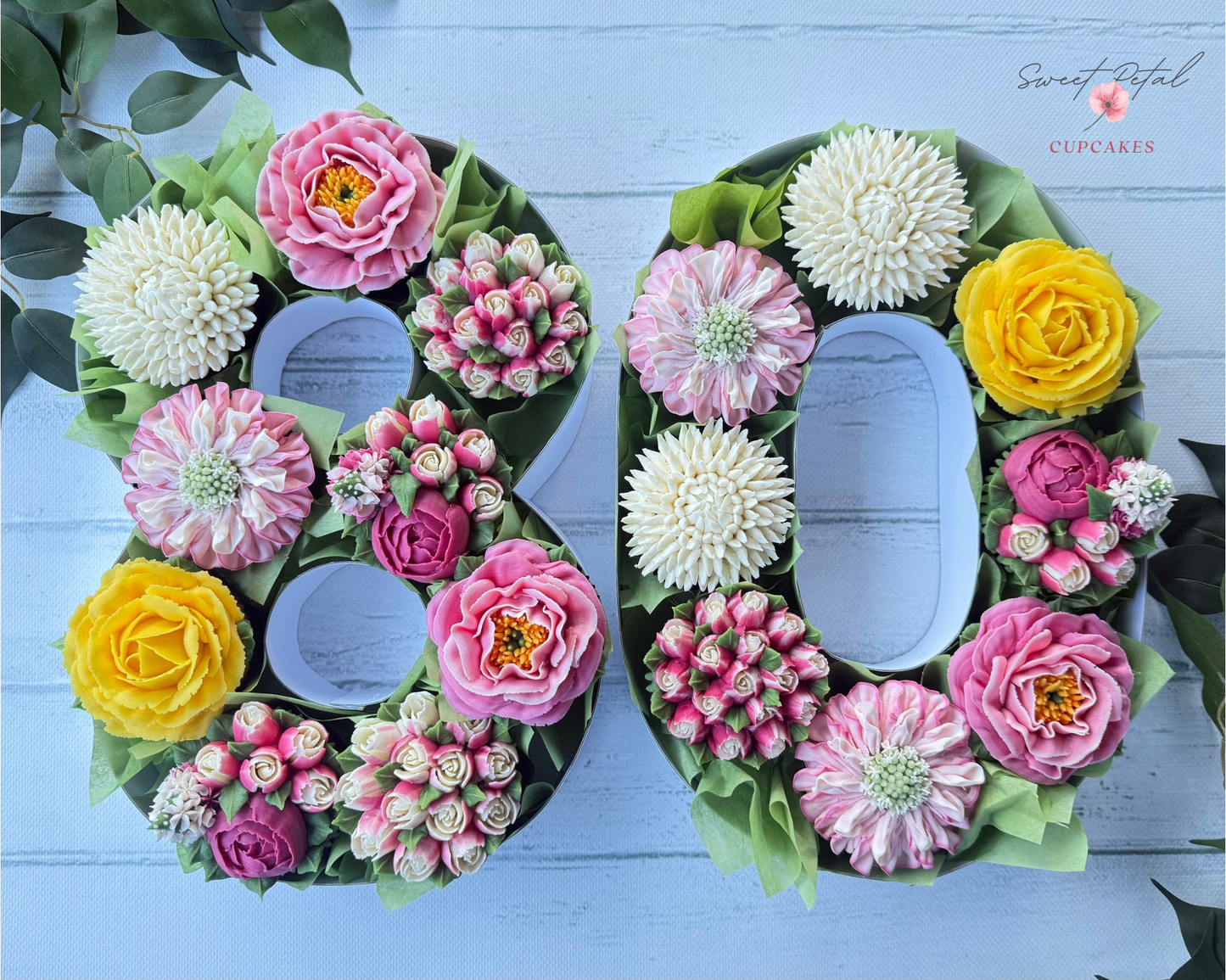 Floral cupcakes in number boxes