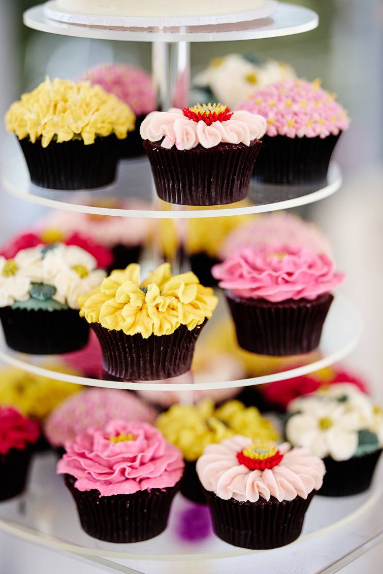 Wedding cake and cupcakes display