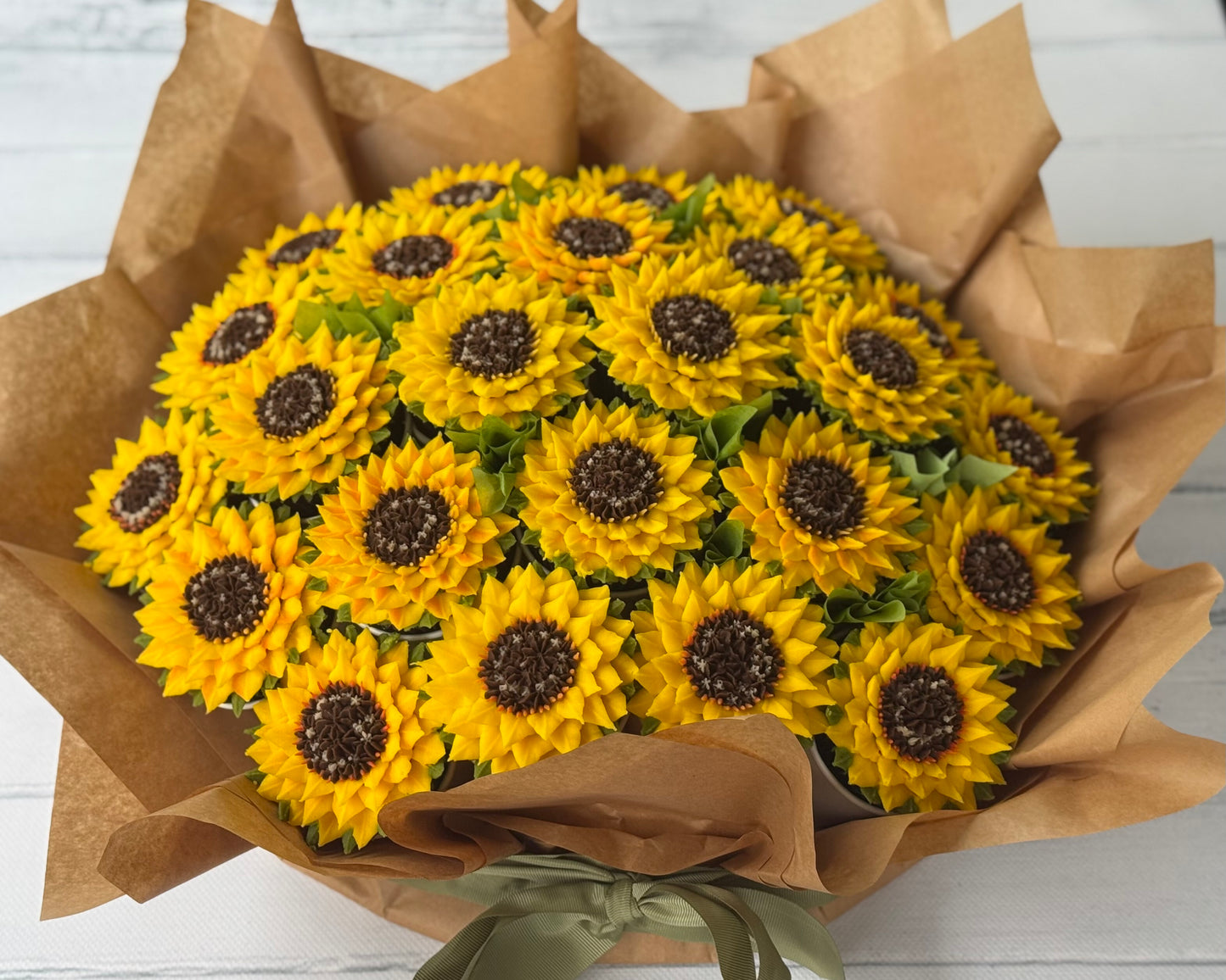 Bouquet of sunflowers cupcakes wrapped in brown paper.