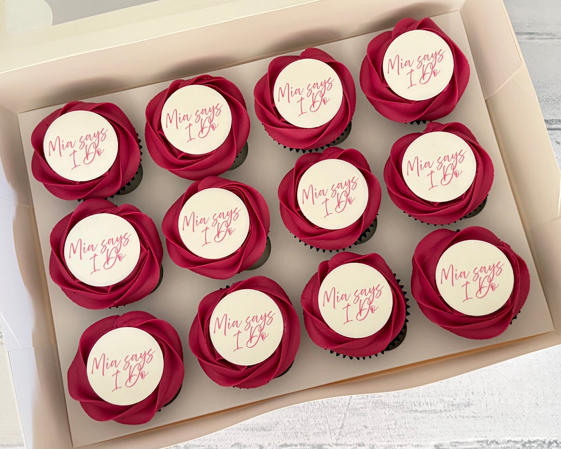 pink classic cupcakes with custom toppers